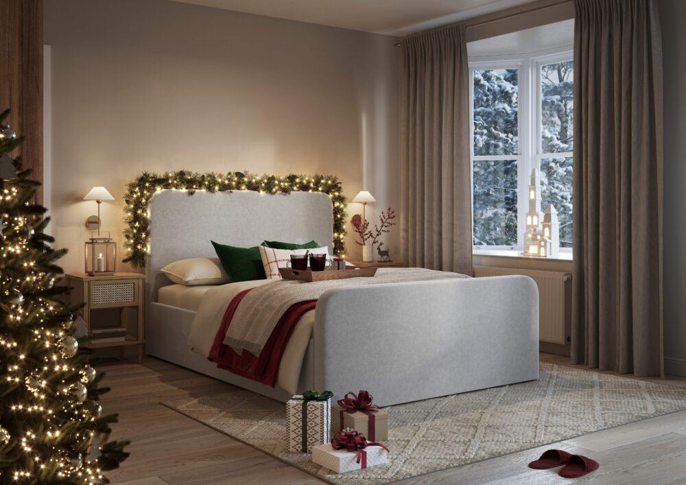Main Bedroom featuring Margot bed in Christmas decor with tree, garland and festive decorations