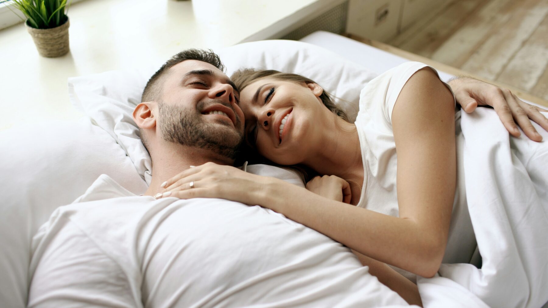 Couple sleeping in bed